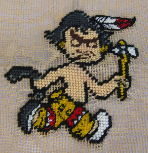 Seminole logo completed in needlepoint